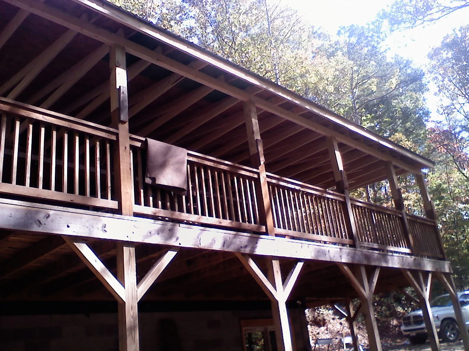 Timber framing under a new elevated porch and deck — Roof Leak Repair in Cosmos by Roofing Brothers
